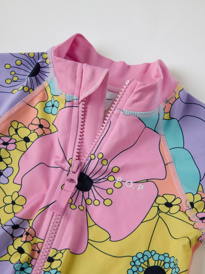 Kurzärmeliger UV-Anzug, geblümt Kurzärmeliger UV-Anzug, geblümt